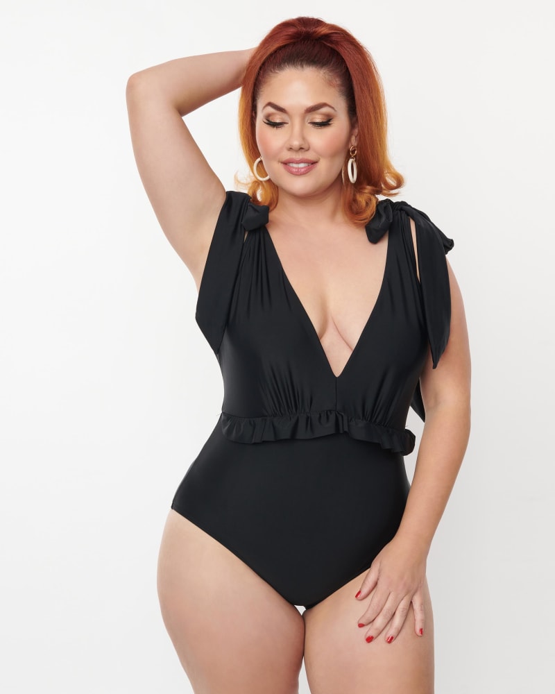 Front of a model wearing a size 3X Unique Vintage Black Plunge One Piece Swimsuit in Black by Unique Vintage. | dia_product_style_image_id:288386